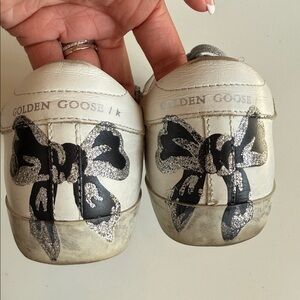 Golden goose black and silver bow sneakers size 37/ 7